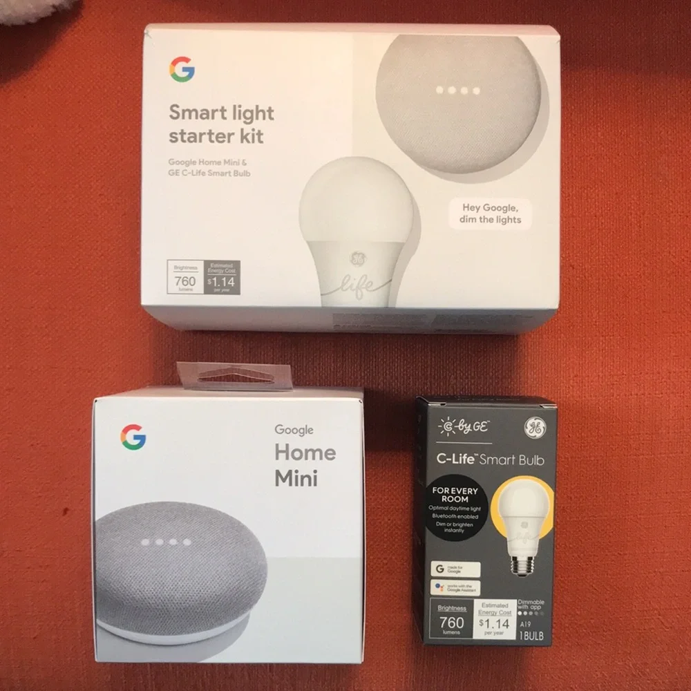 New in box Google Home Mini and Smart Lite Kit